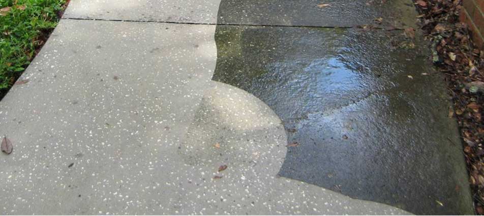 Envision Property Maintenance sidewalk power washing services